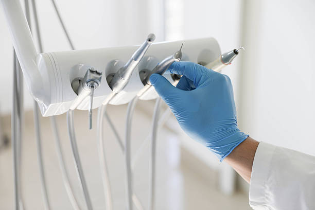 Professional Tooth Extraction technician working in Garfield County County, OK